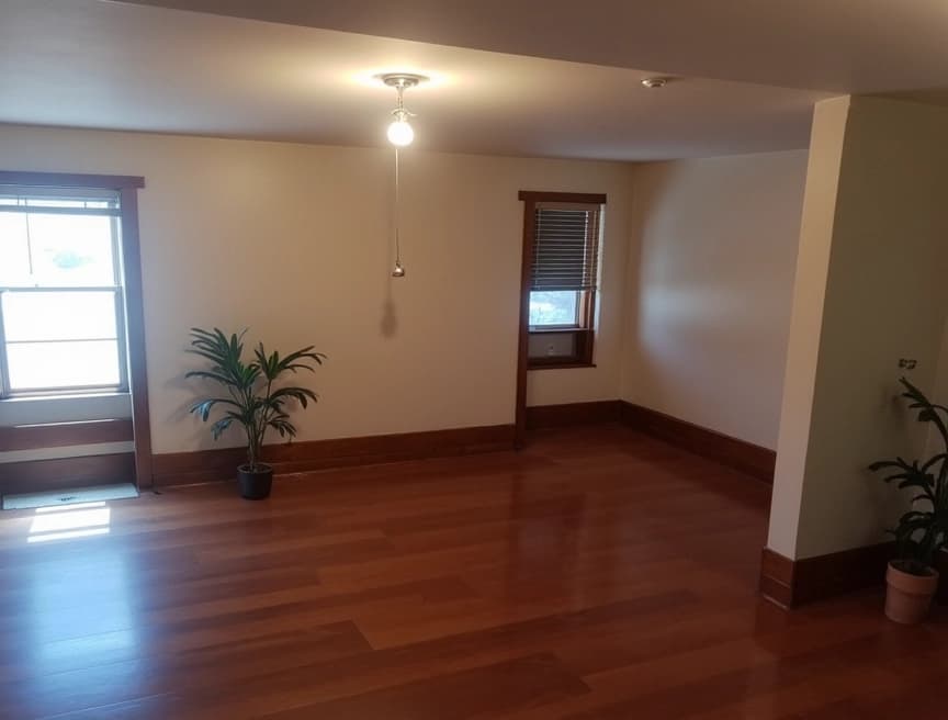 HomestagingKIEin Bild von einer Wohnung mit Schild zum Vermieten